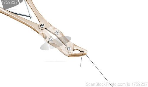 Image of needle holder with an atraumatic curved cutting needle attached