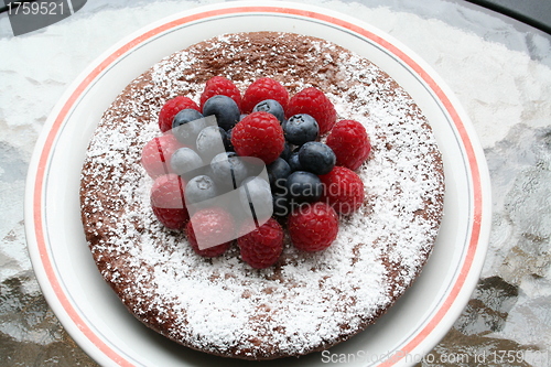 Image of Chocolate gateau with berries