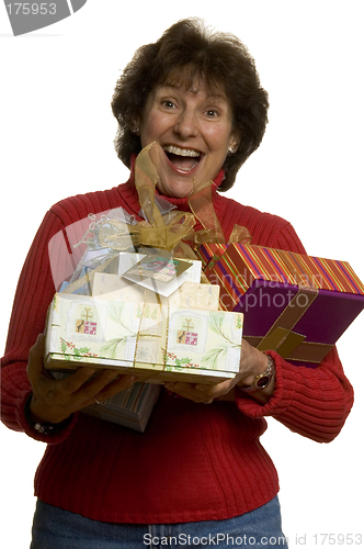 Image of happy woman with gifts stack