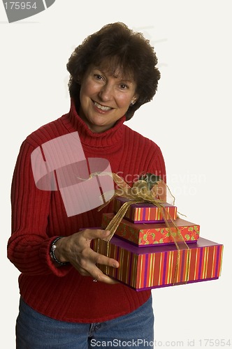 Image of happy woman with gifts stack