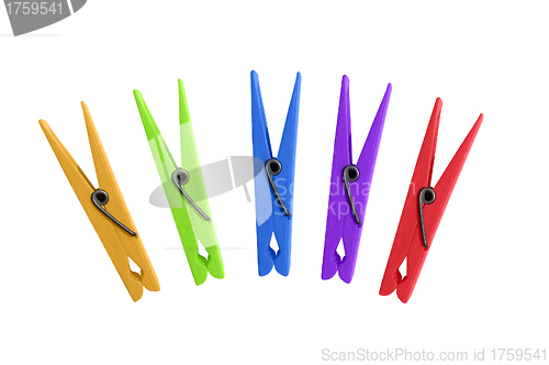 Image of group of clothepegs or clothespins isolated on white