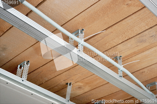 Image of New electrical wiring in a suspended ceiling