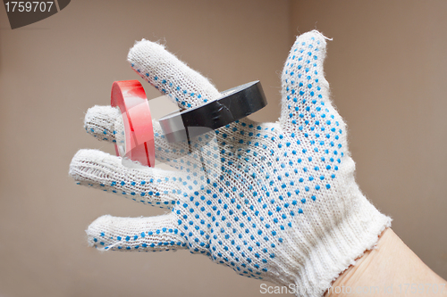 Image of Two ringlet tape in hand