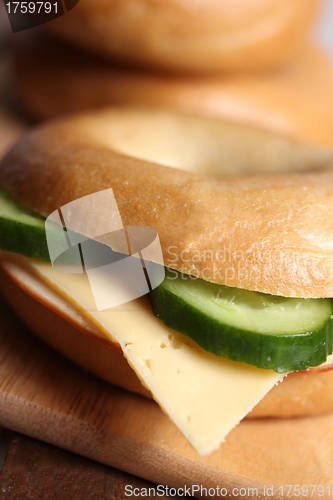 Image of fresh cheese and ham bagel 