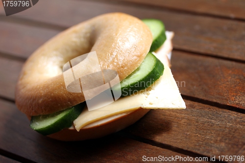 Image of fresh cheese and ham bagel 