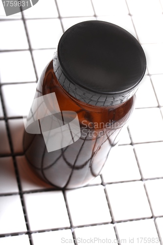 Image of brown glass beverage