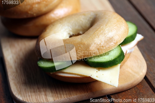 Image of fresh cheese and ham bagel 