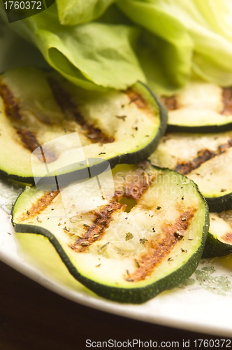 Image of Grilled organic zucchini slices with herbs and spices