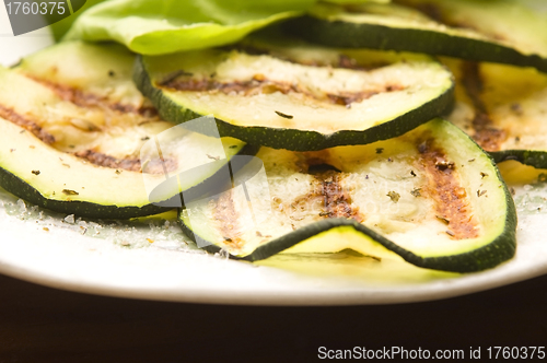 Image of Grilled organic zucchini slices with herbs and spices