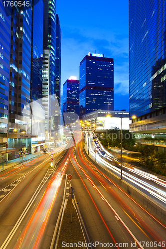 Image of Hong Kong at night, traffic in city.