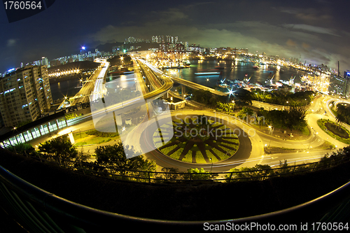 Image of Hong Kong night traffic with modern buildings background