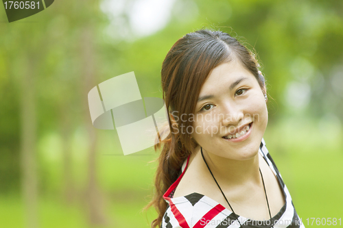 Image of Asian girl with happy smile