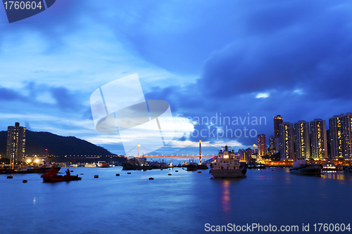 Image of Hong Kong bridge and apartment blocks at night