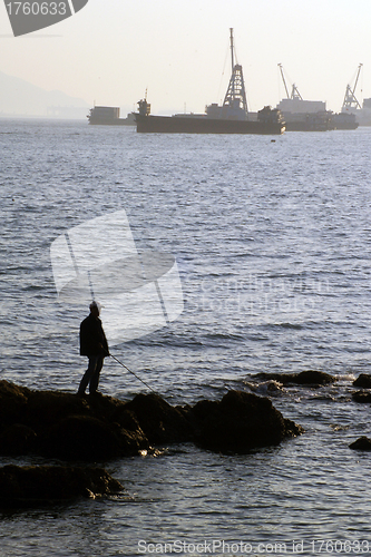 Image of Fisherman along the coast