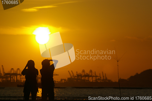 Image of Photographer at sunset