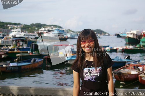 Image of Asian woman travelling with smile