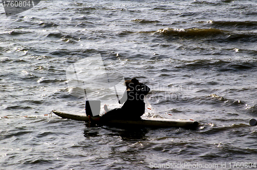 Image of Fisherman on the sea catching fishes