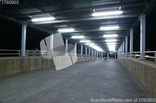 Image of Footbridge at night with nobody
