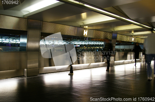 Image of Moving pedestrian in footbridge