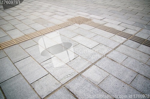 Image of Traffic route for blind peoples with cobblestones 
