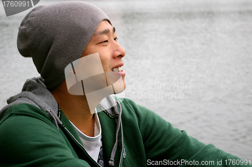 Image of Asian man smiling