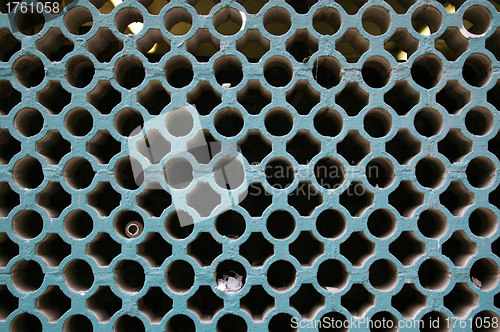 Image of Green wall with holes