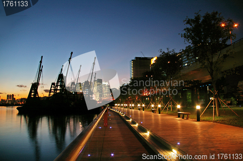 Image of Hong Kong at night next to the pier