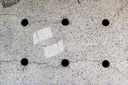 Image of Six holes on the ground