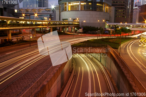 Image of Traffic in modern city at night