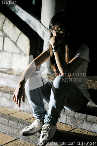 Image of Chinese sad girl under shadow