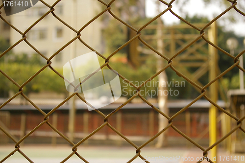 Image of Basketball court through the net