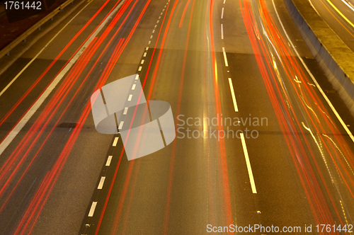 Image of Red light trails on highway