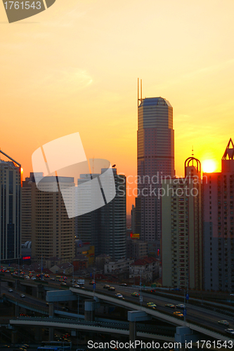 Image of Shanghai business district at sunset