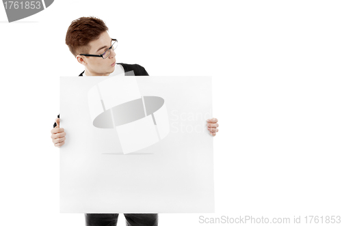 Image of Young man with a blank baner