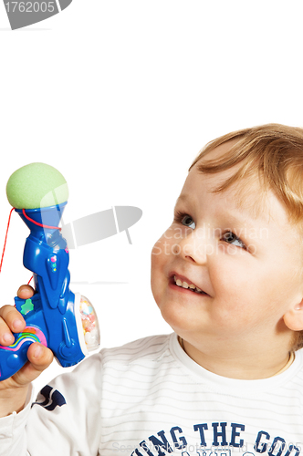 Image of Portrait of the little boy with a toy pistol