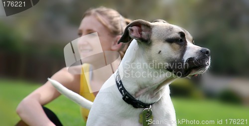 Image of Dog and its girl