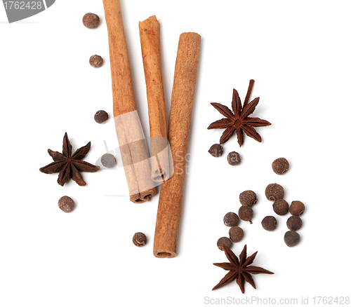 Image of Cinnamon sticks, anise stars and black peppercorns