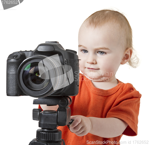 Image of young child with digital camera