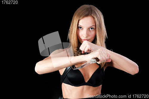 Image of Pretty girl with knife