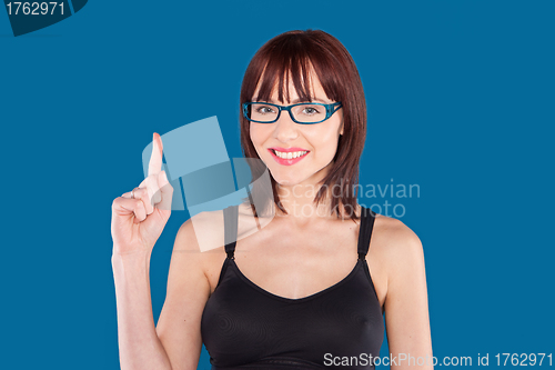 Image of woman wearing a tank top and eyeglasses