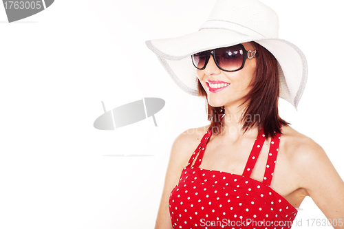 Image of Smiling female with hat and sunglasses