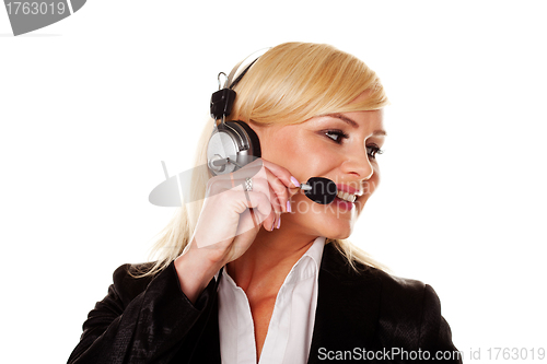 Image of Smiling woman using headphones and mike