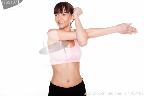 Image of woman doing arm stretching