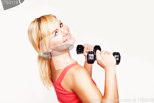 Image of Gorgeous young woman working out