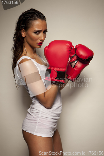 Image of Sexy woman with red boxing gloves