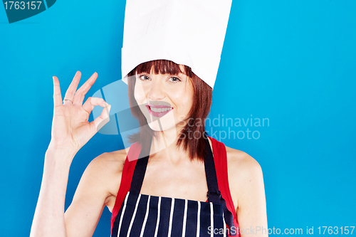 Image of Smiling Chef Giving Perfection Gesture