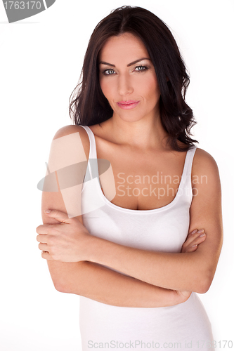Image of Brunette woman looking impatient