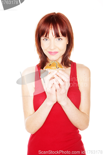 Image of Happy Woman Holding Large Muffin