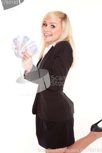 Image of Ecstatic woman with a fistful of money