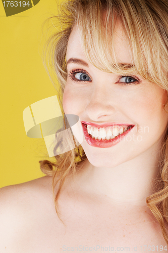 Image of Close-up portrait of smiling blonde